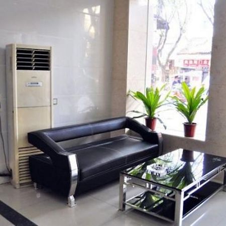 Aoqi Business Hotel Canton Extérieur photo