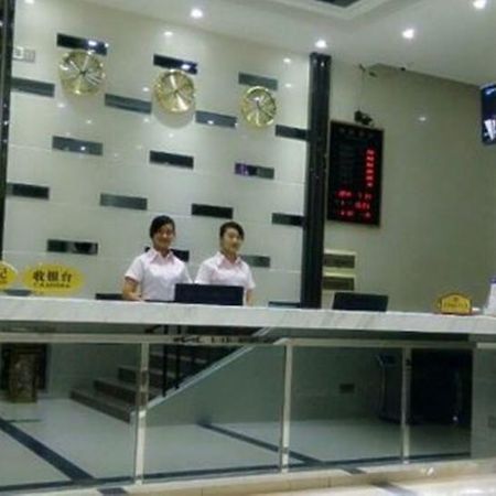Aoqi Business Hotel Canton Extérieur photo