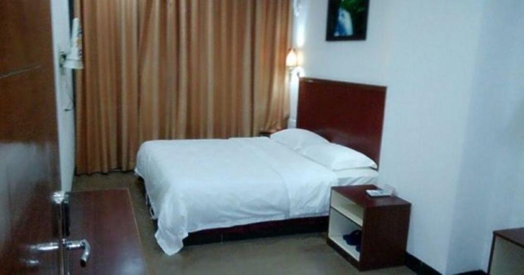 Aoqi Business Hotel Canton Extérieur photo