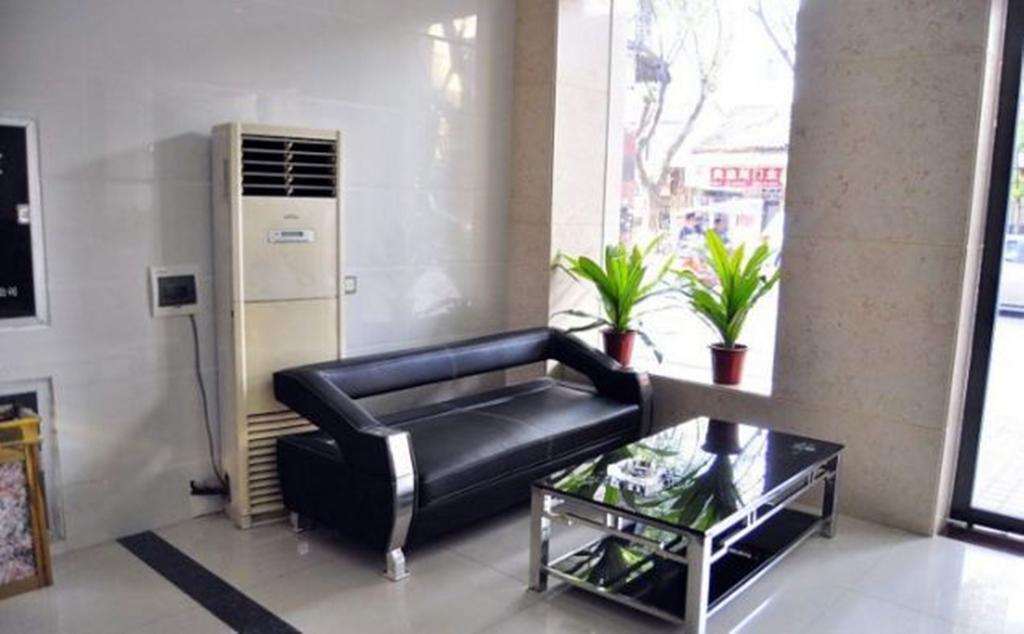 Aoqi Business Hotel Canton Extérieur photo