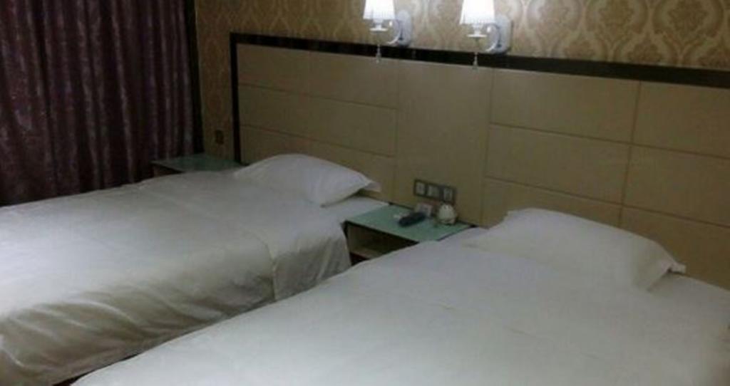 Aoqi Business Hotel Canton Extérieur photo