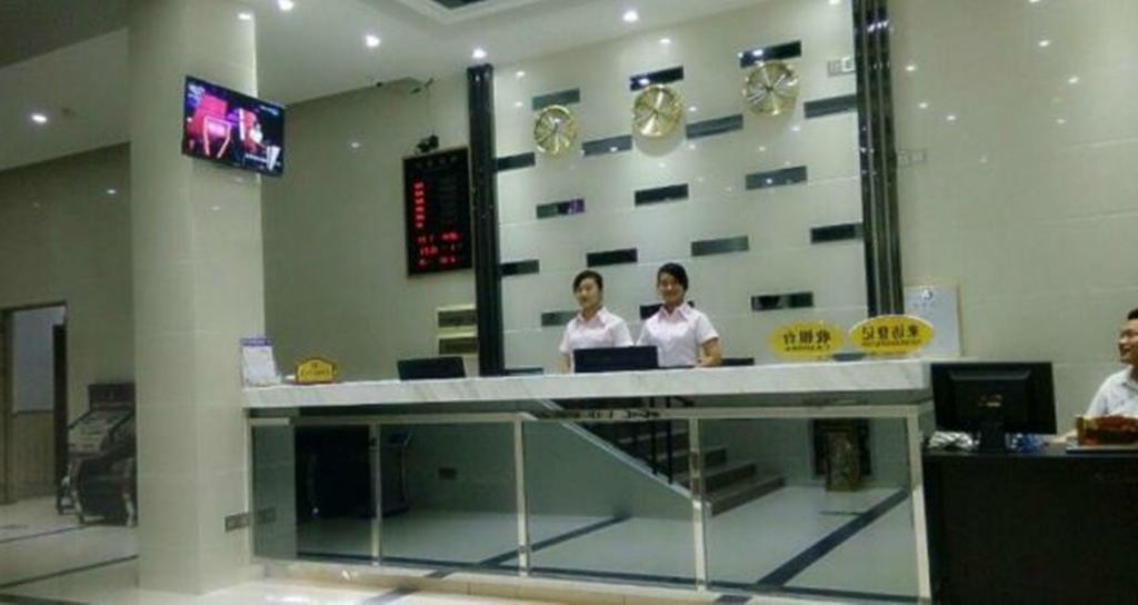 Aoqi Business Hotel Canton Extérieur photo