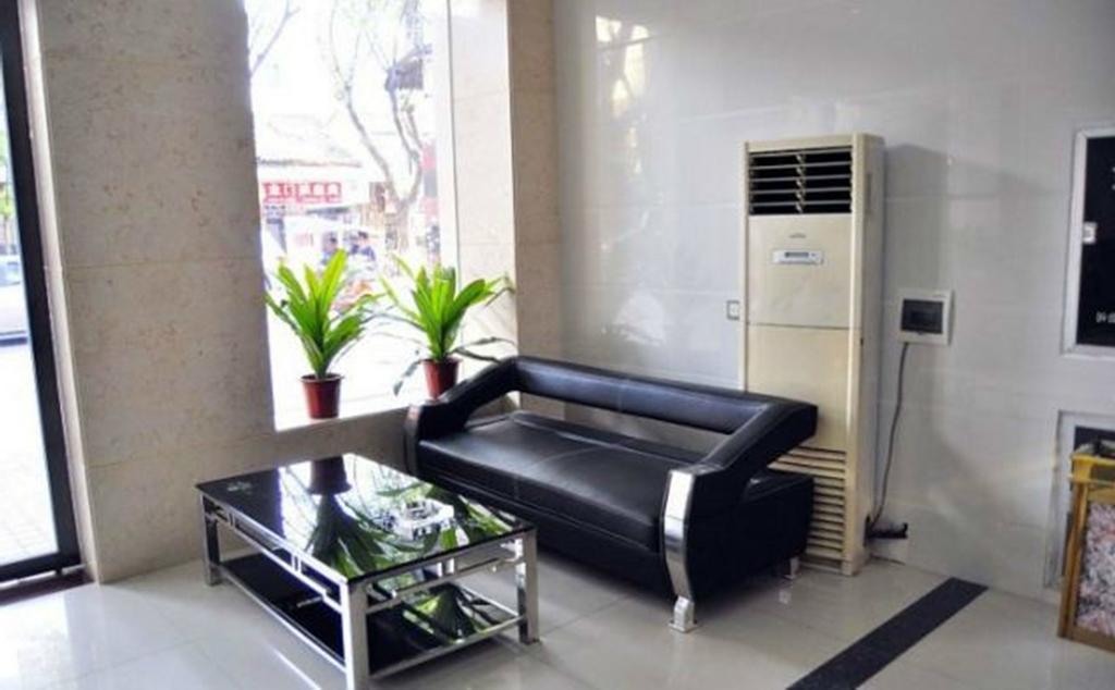 Aoqi Business Hotel Canton Extérieur photo