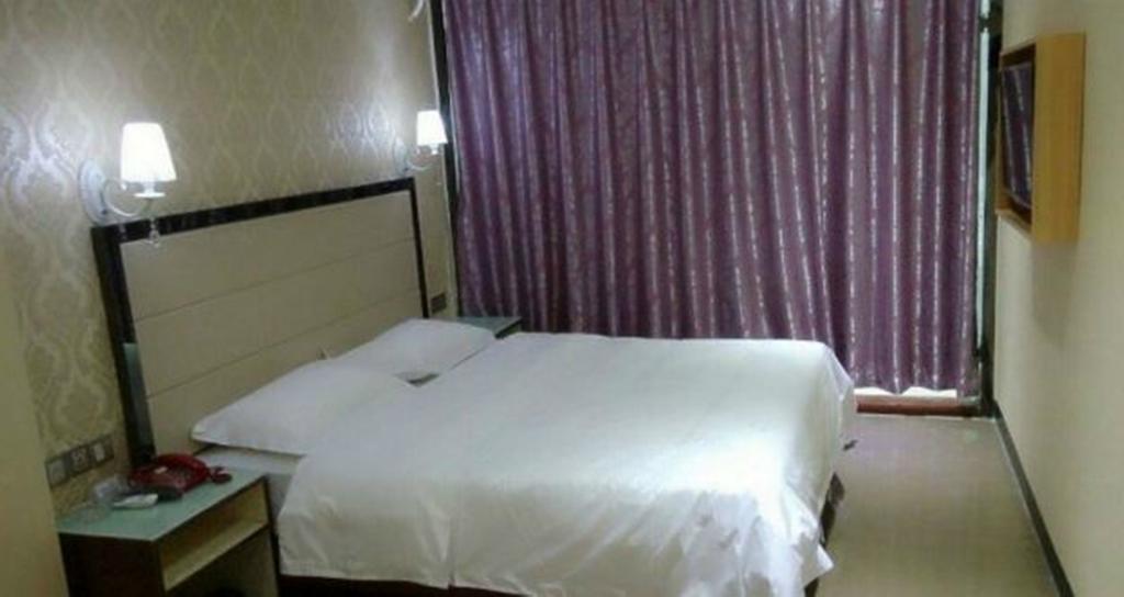 Aoqi Business Hotel Canton Extérieur photo