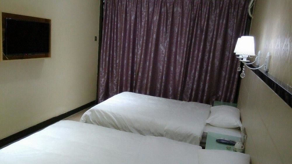 Aoqi Business Hotel Canton Extérieur photo